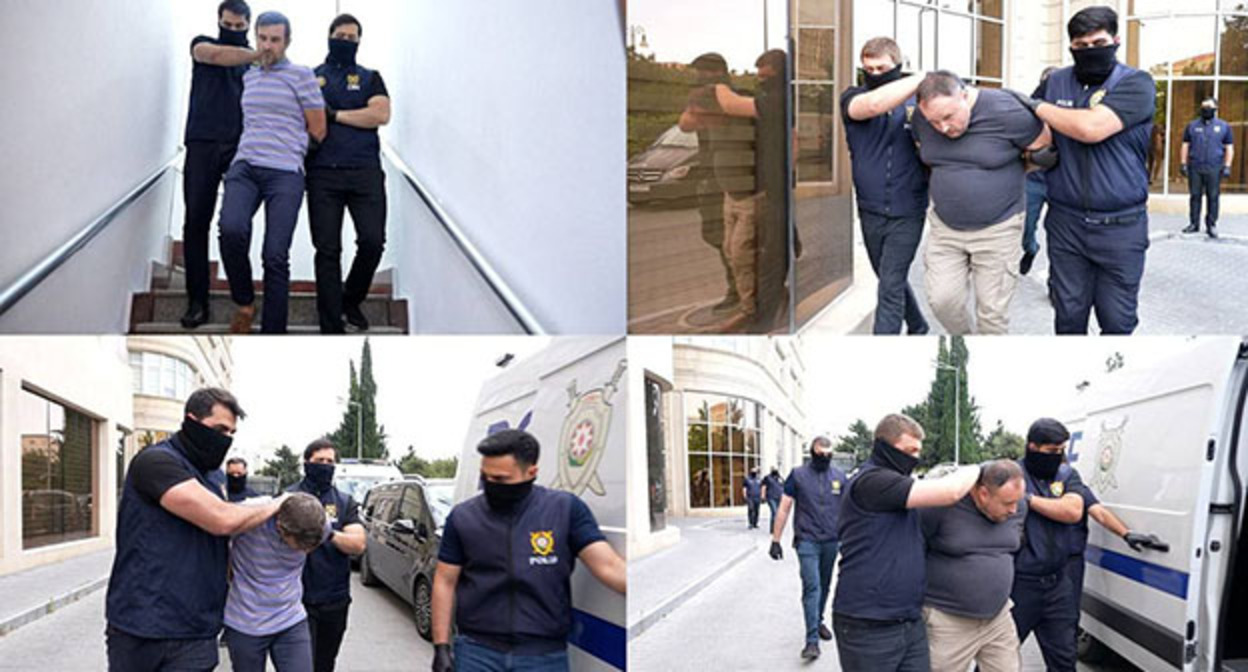 Силовики выводят задержанных в офисе "Sputnik Азербайджан". Фото: https://minval.az/news/124473135